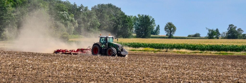tractor-on a dusty field